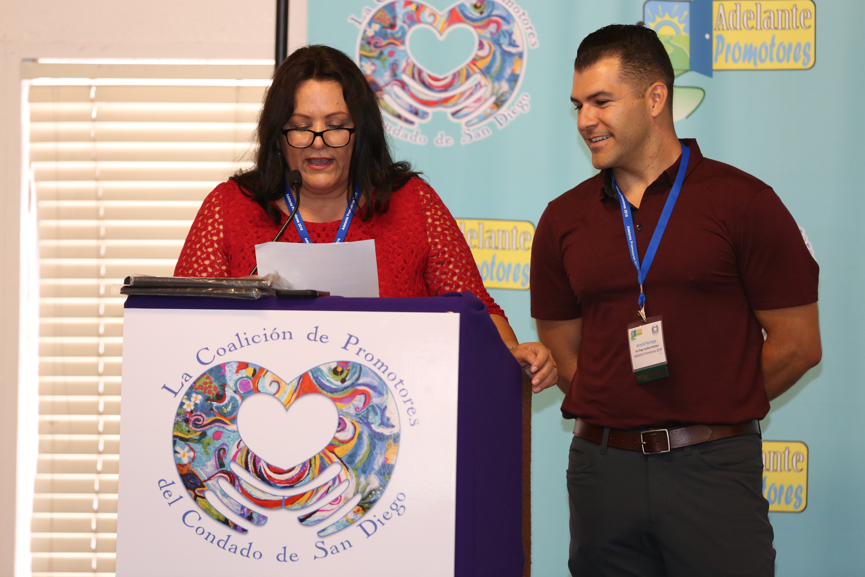 2018 Adelante Promotores Conference Opening Remarks, Ms. Margarita Holguin (Left), Mr. Arnold Noriega (Right), Co-Chairs of the San Diego County Promotores Coalition